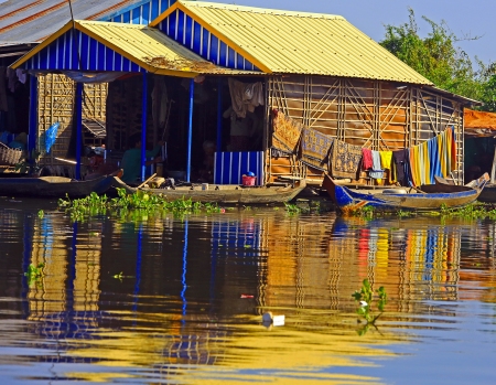 Colorful homestead reflections Floating Villages Cambodia